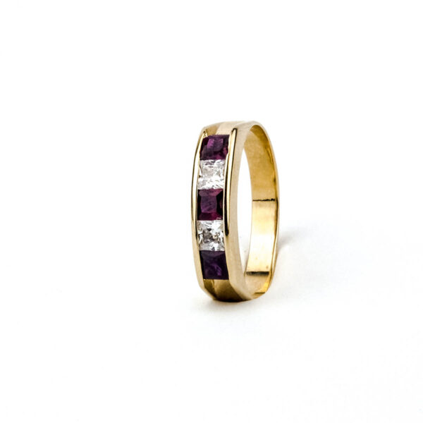 Anillo cintillo en riel oro 18k con circón